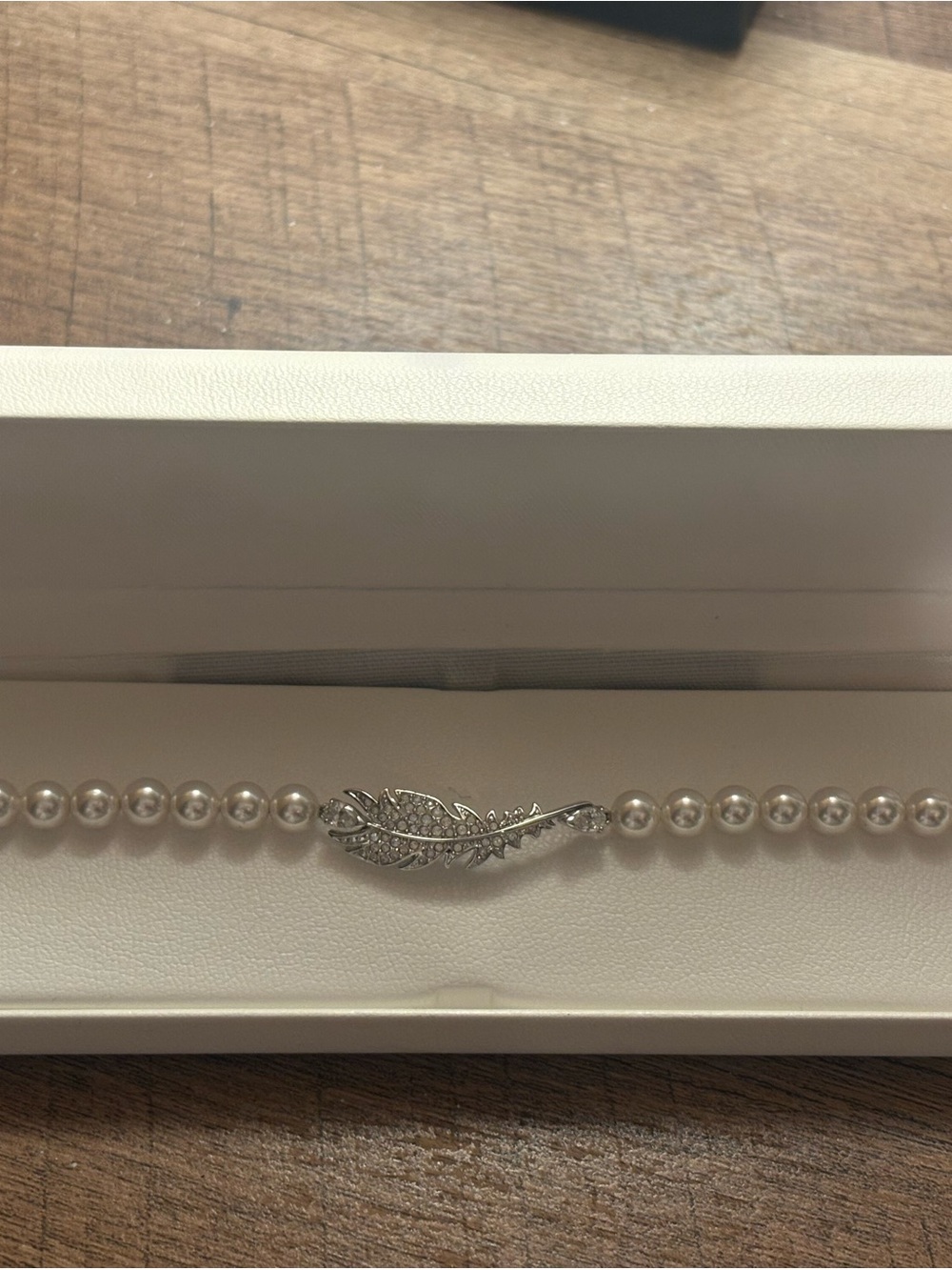 Swarovski White Pearl Bracelet with Silver Feather Clasp